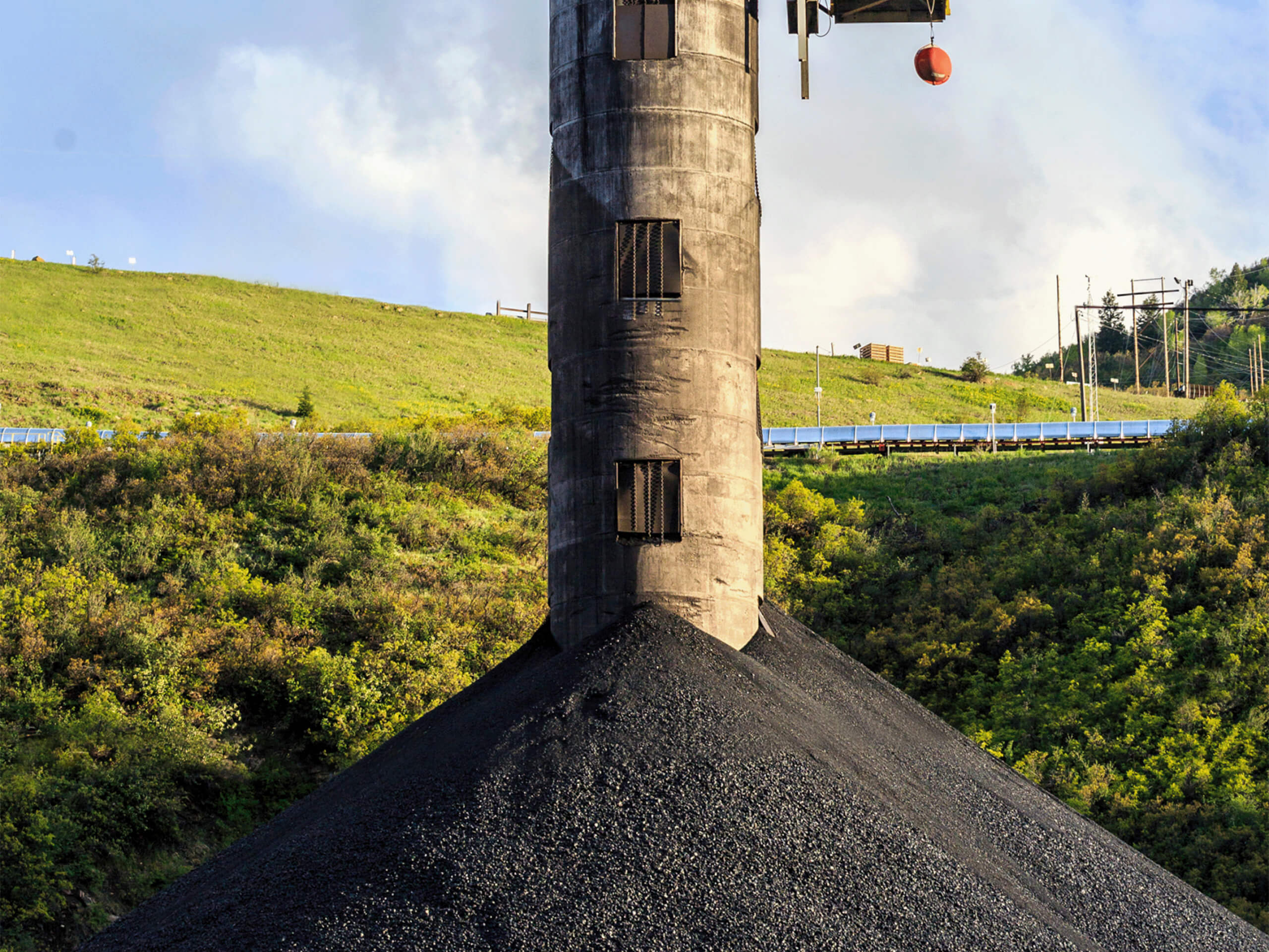 Coal silos and day bins at an energy facility