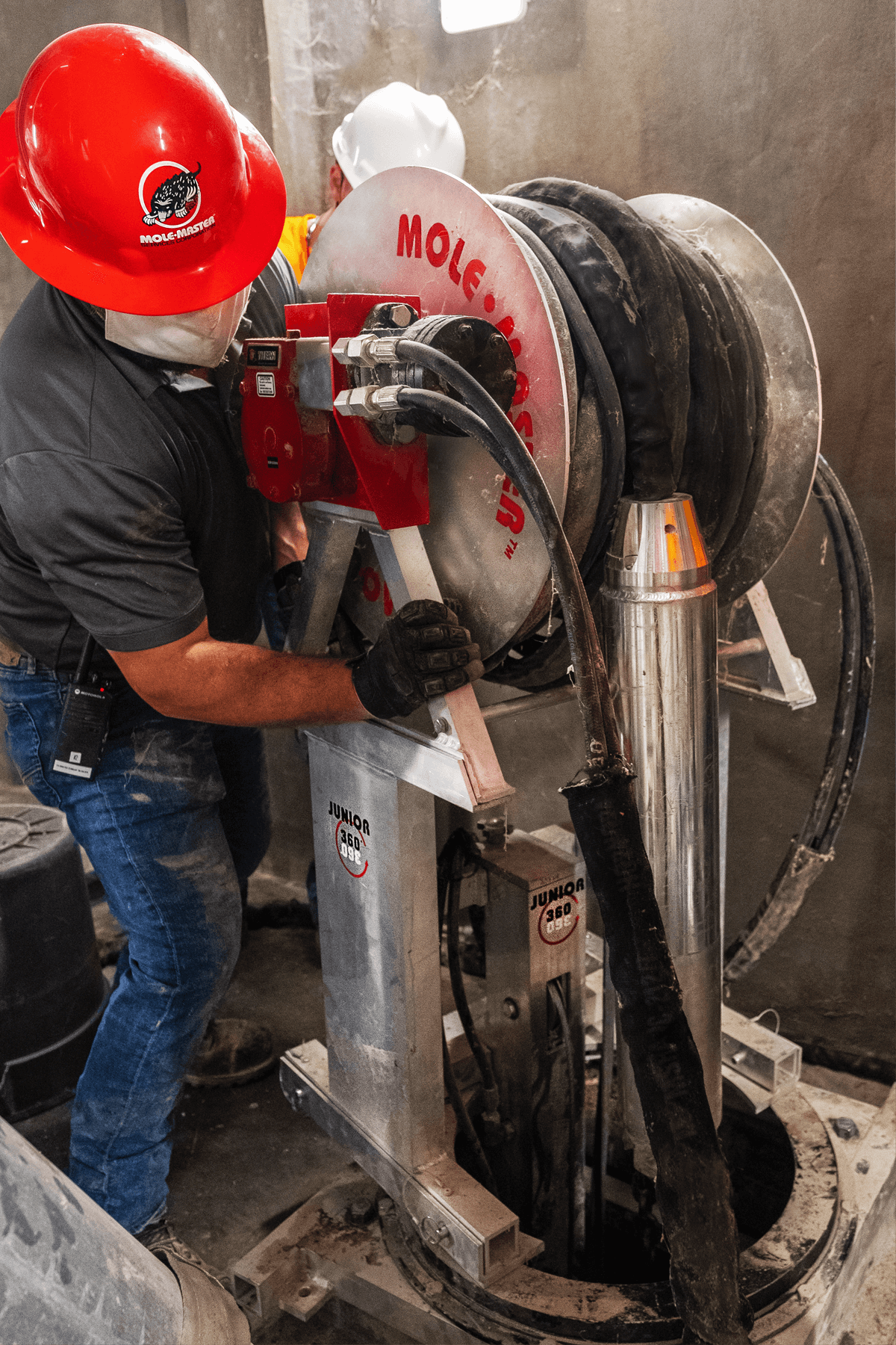 Mole&middot;Master&reg; operator running the Junior 360&deg;&reg; during a silo cleaning job