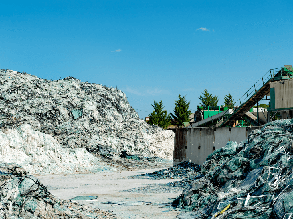 Glass industry facility: weigh bins and pneumatic conveyance for feldspar, alumina, limestone, and chemical additives