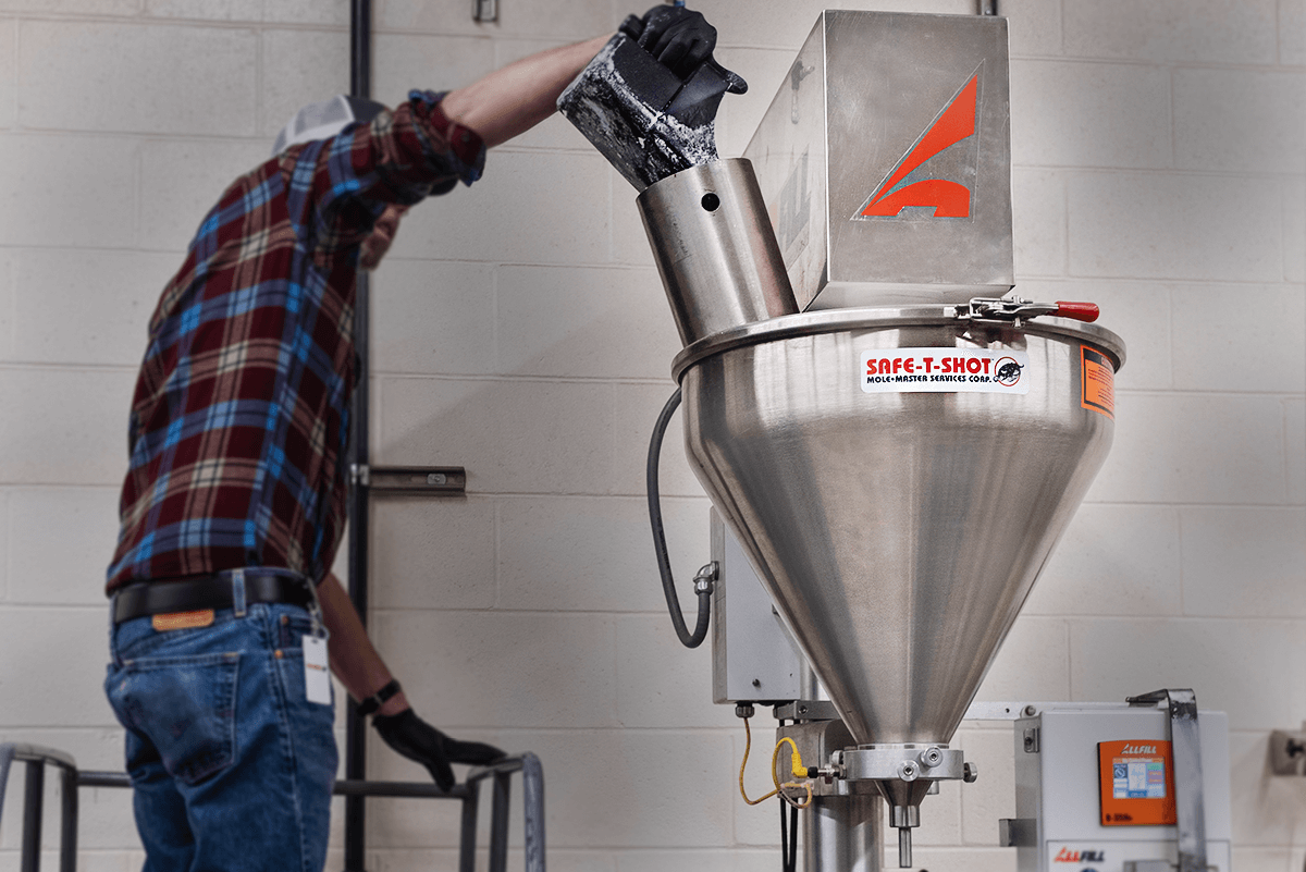 Safe-T-Shot&reg; operator recharging and inspecting equipment between deployments